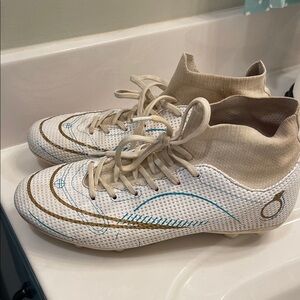 White Soccer Cleats with Gold & Teal Accents